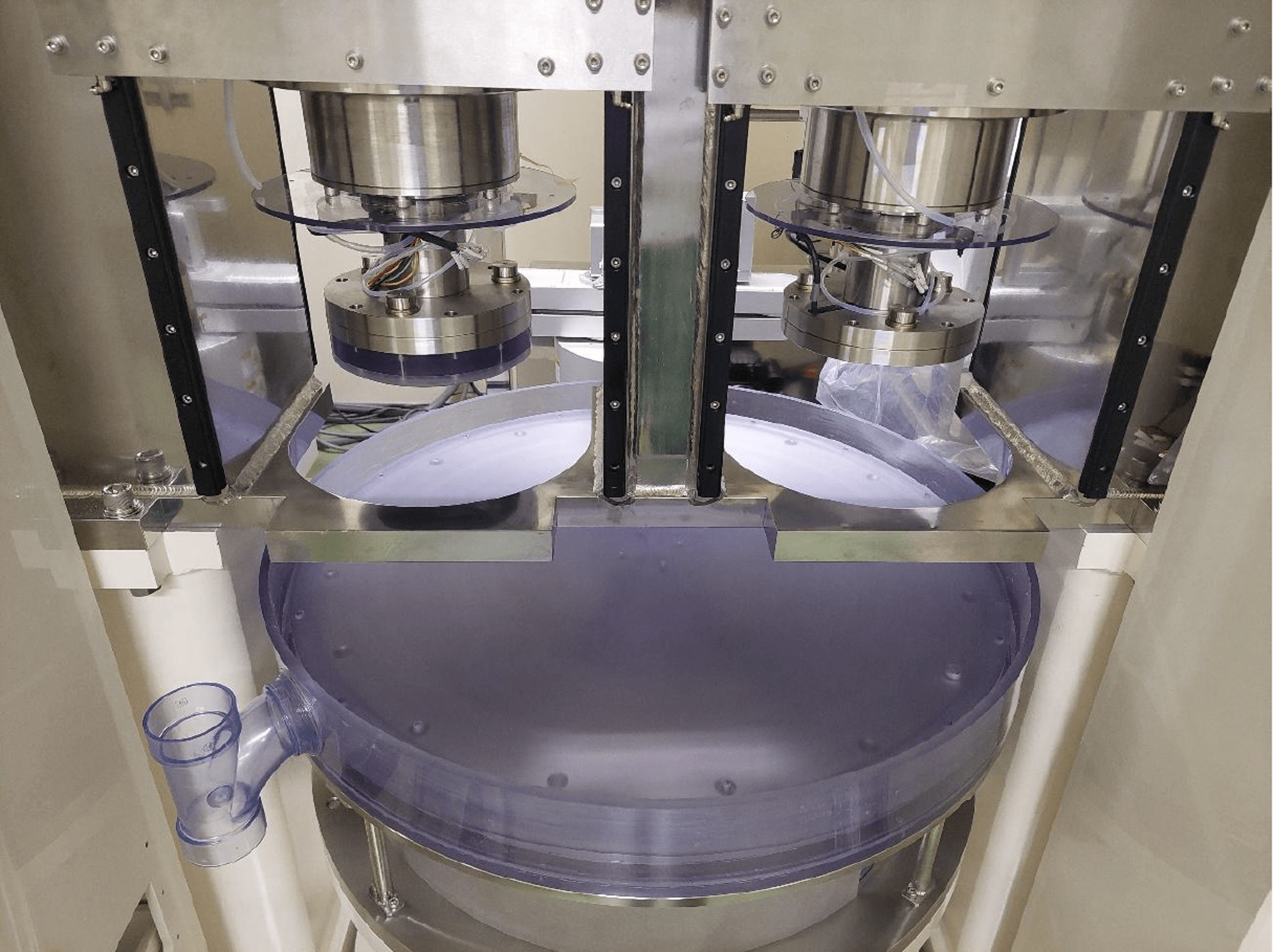 CARE-TEC 200mm system — polishing heads close-up